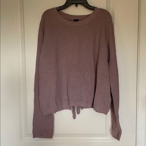 purple sweater with tie in the back